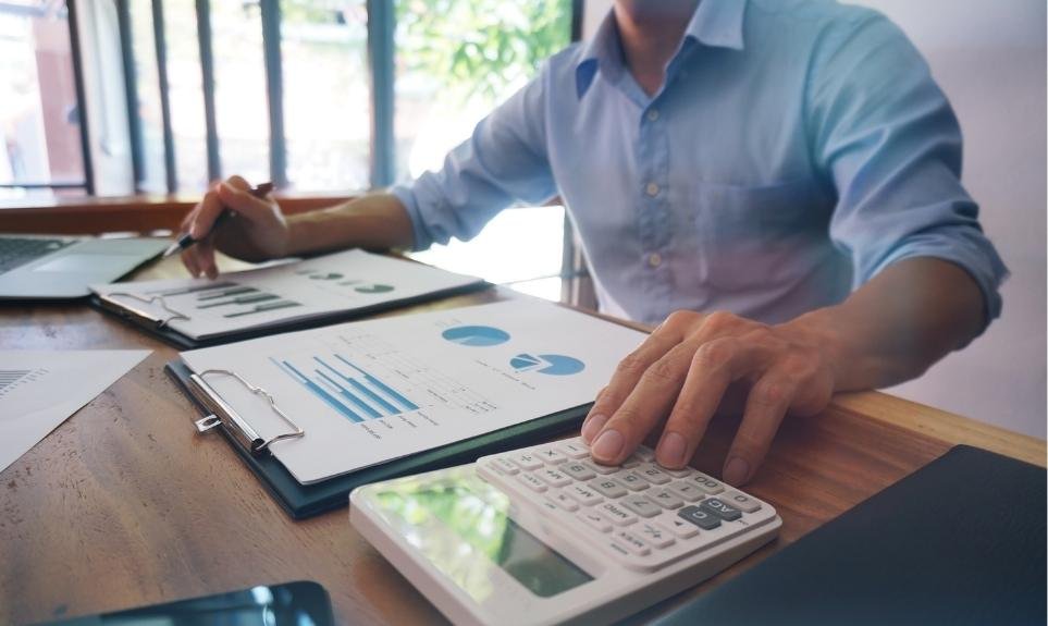 3 Person looking at graphs