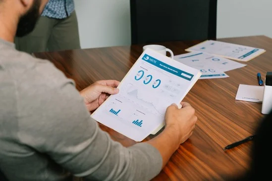 person-holding-report